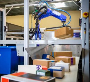 AmbiSort A-Series AI-powered robotic parcel sorting robot with Conveyor-fed automated induction